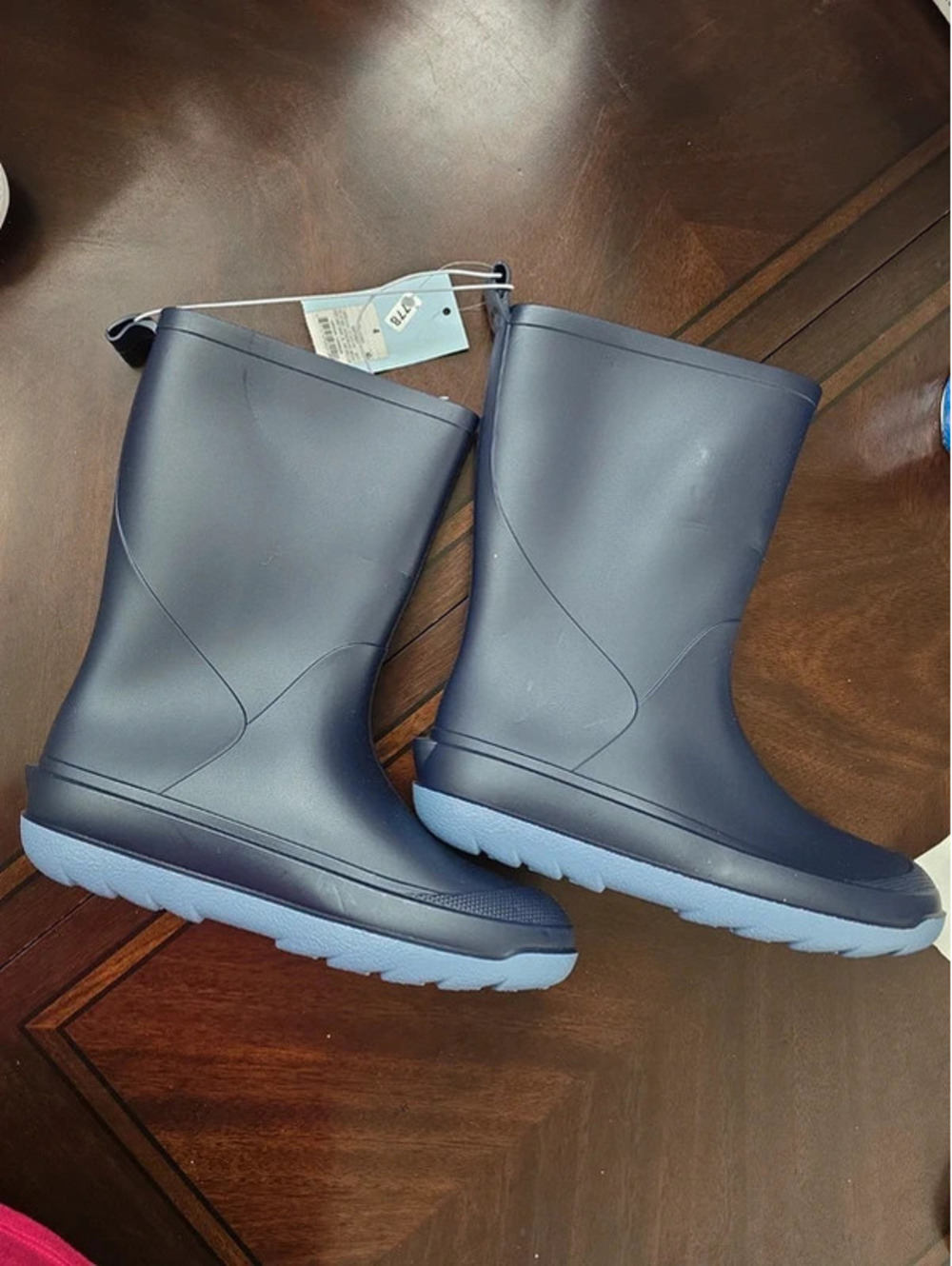 Size 4 brand new rainboots from target item. 1778 boxG11